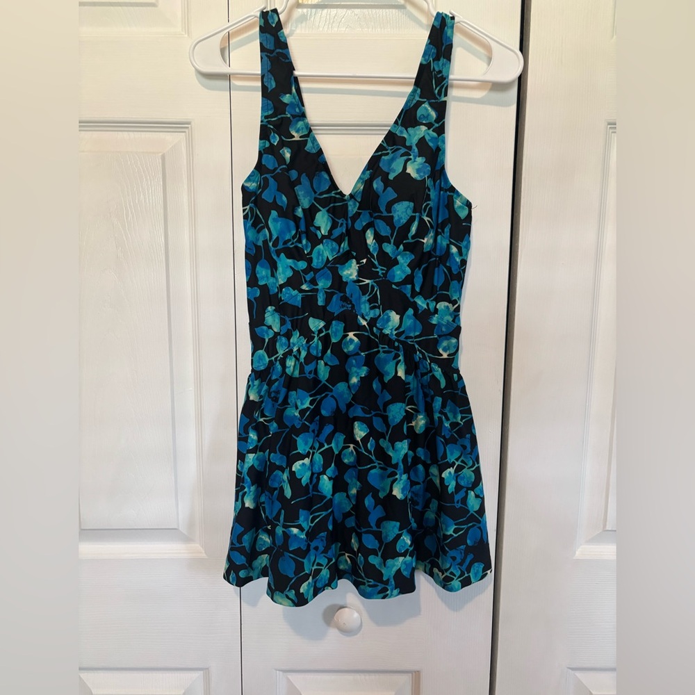 Vibrant Blue and Green One Piece Swimsuit with Flowy Design
